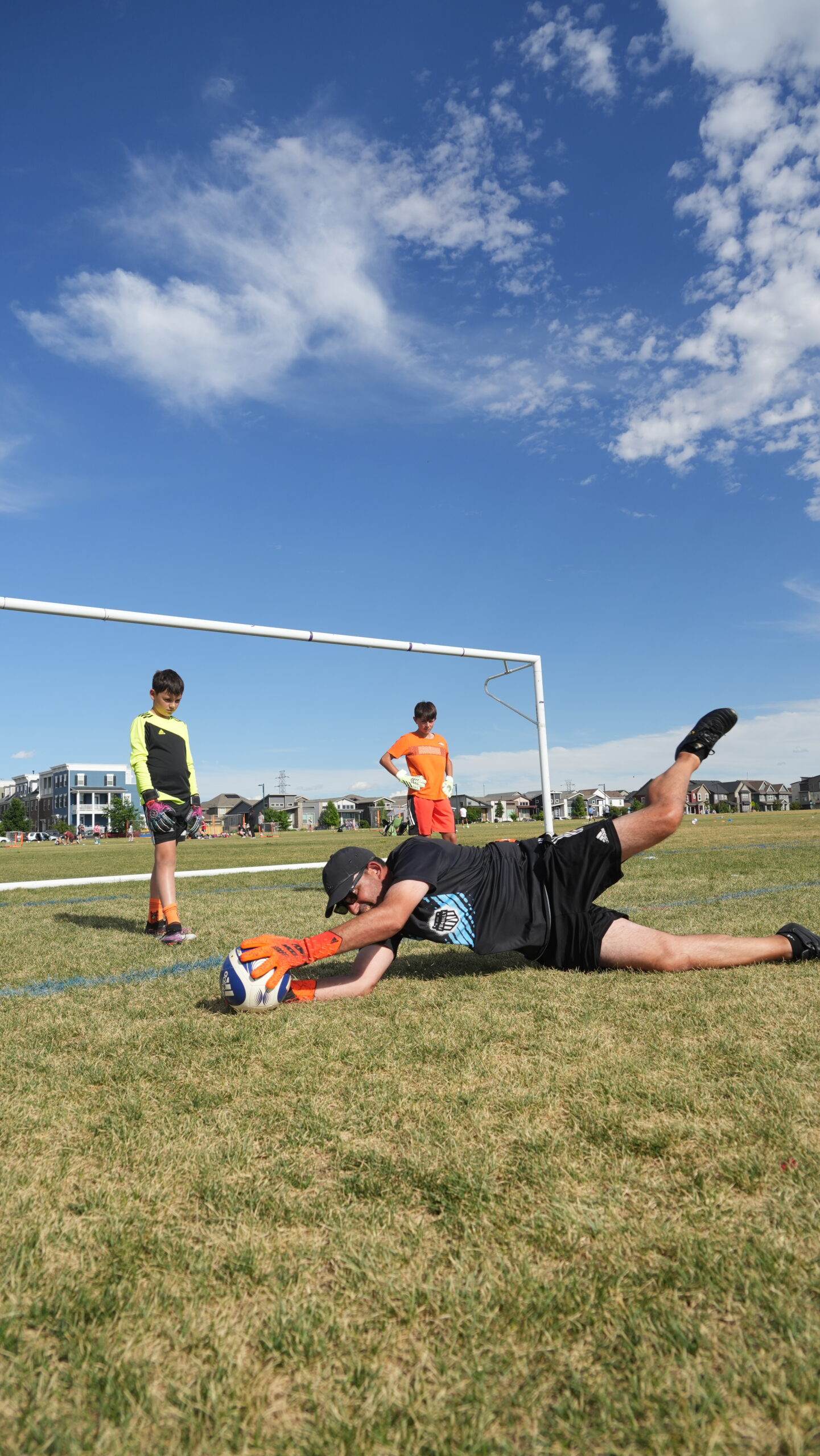 Goalkeeper diving for the ball during training at Fussbally